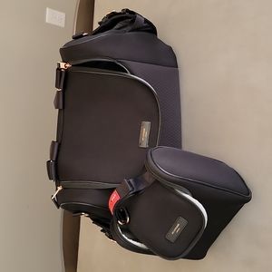 Storksak Poppy Luxe changing bag with matching food and bottle bag